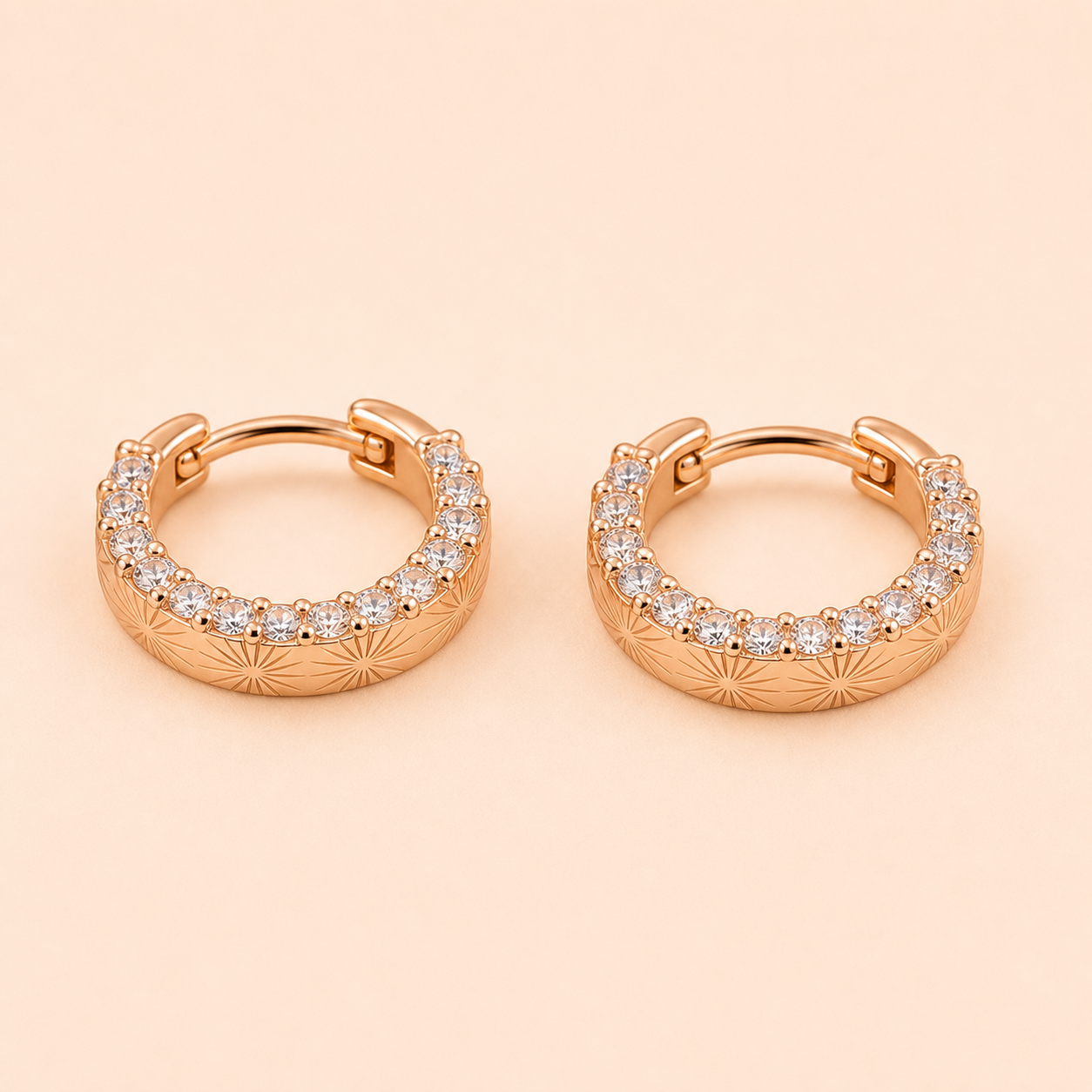 Brunch Crystal Hoops clean product photo on warm rose background