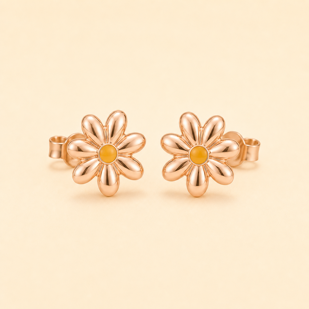 Daisy Glow Studs clean product photo on pale yellow background