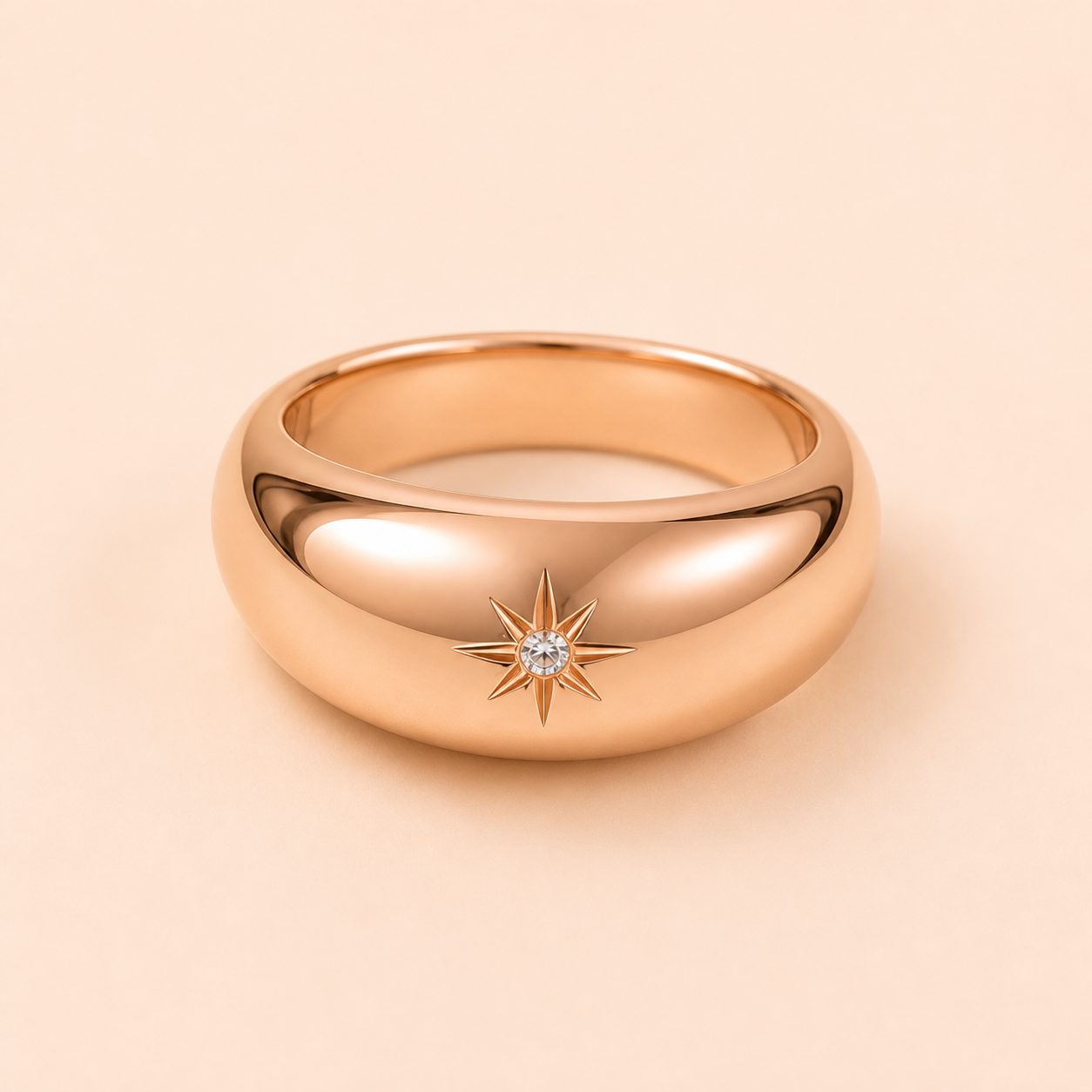 Star Dome Ring clean product photo on warm blush background