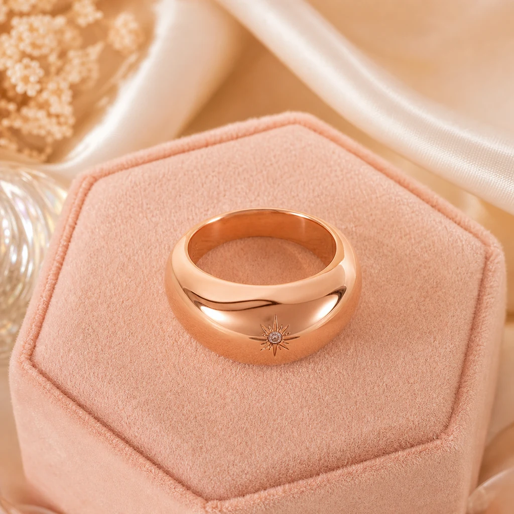 Rose-gold dome ring on blush velvet